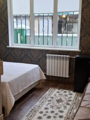 Двухместный с двуспальной кроватью и диваном